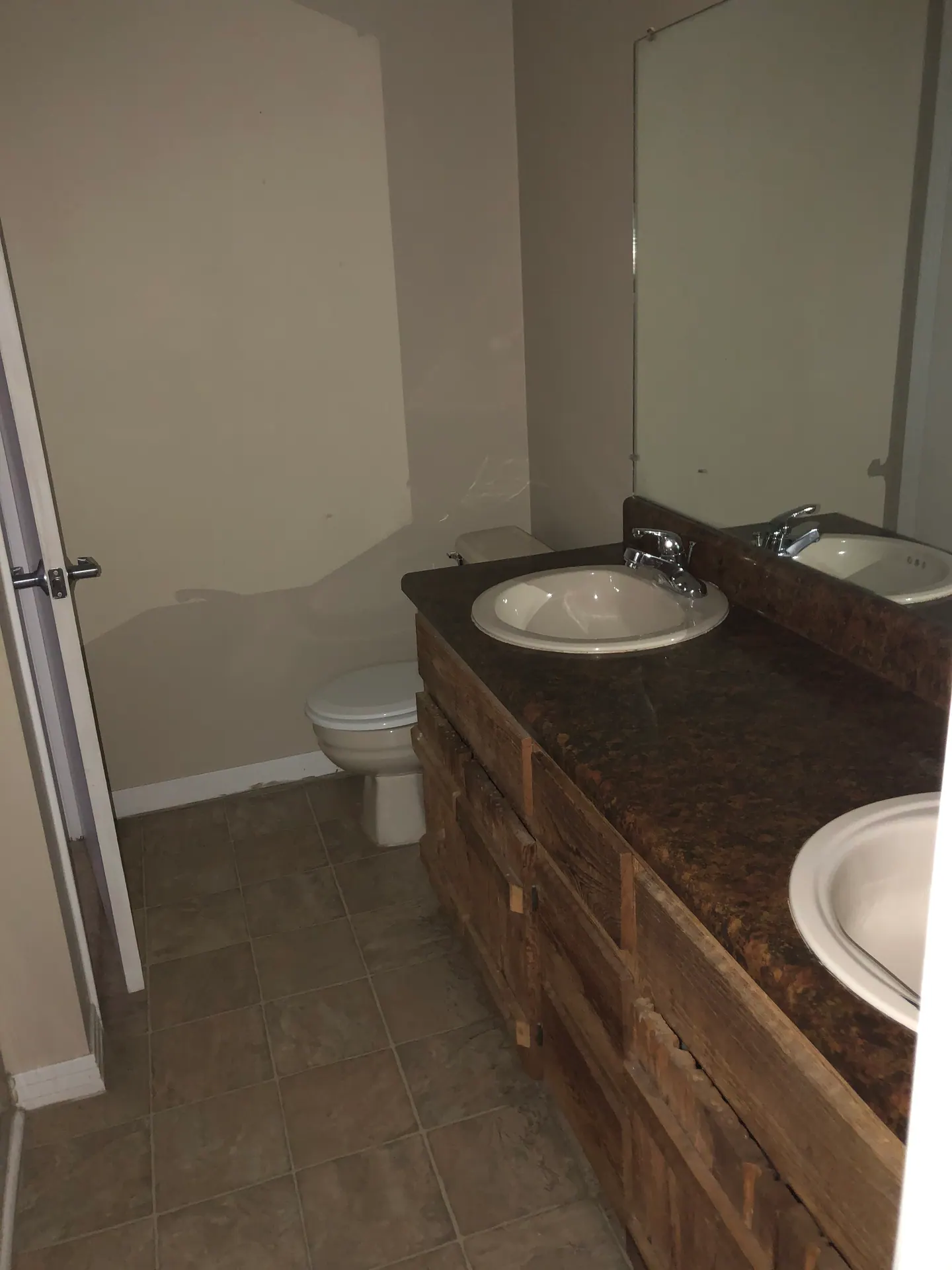 Full bathroom with a double-sink vanity